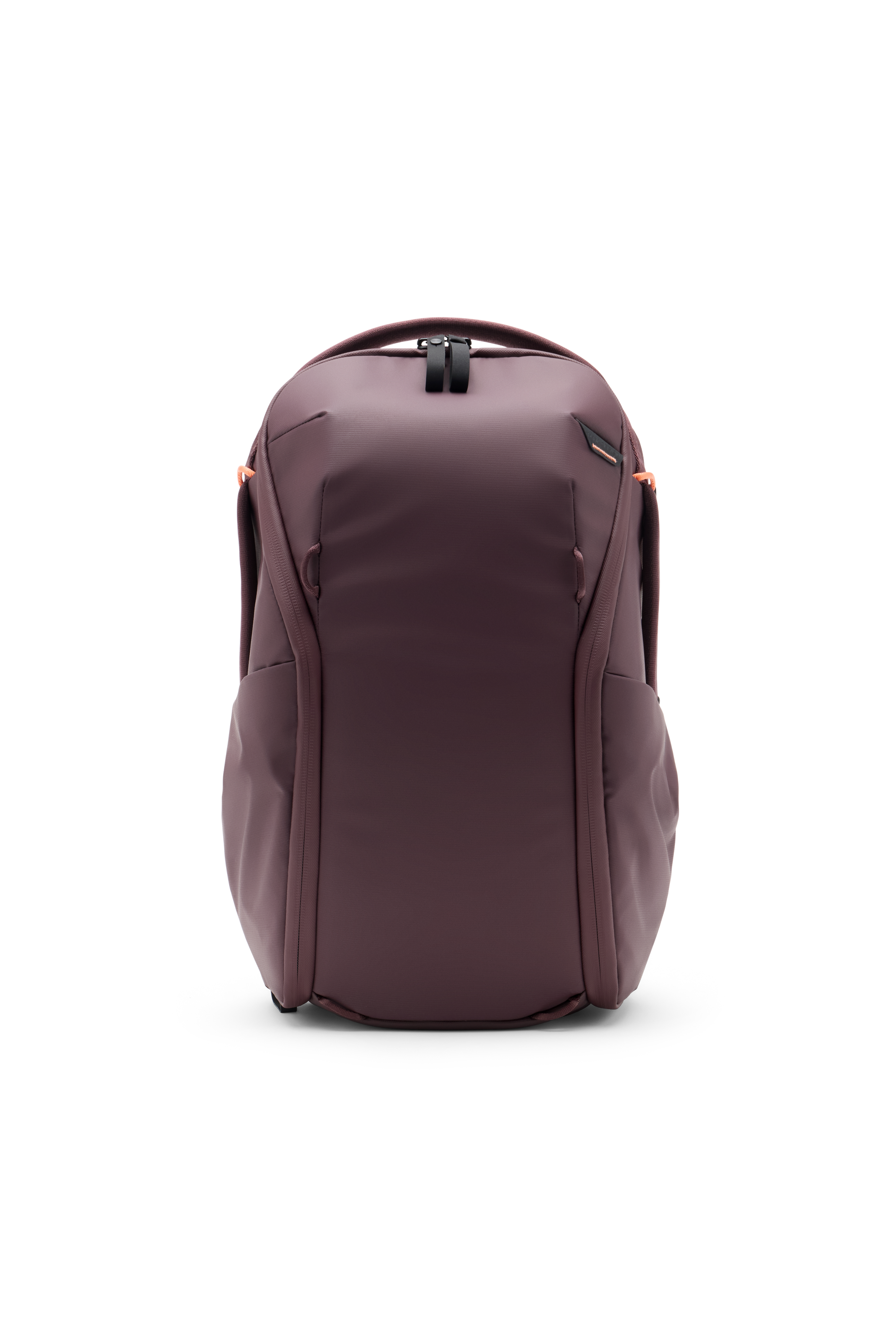 Peak Design Everyday Backpack Zip 15L being used on a rainy city street with a photographer adjusting lenses